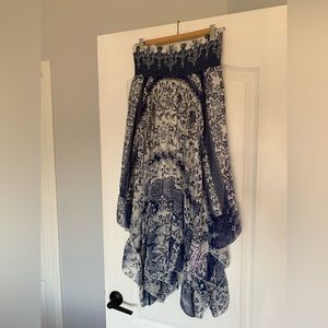 Flowy peasant skirt with elastic waist and different hem lengths